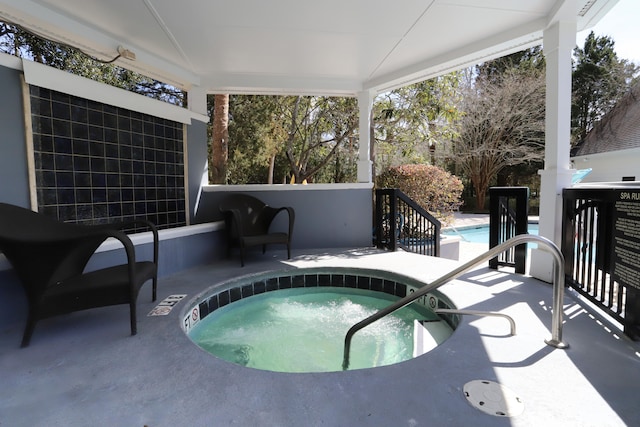 pool featuring a community hot tub