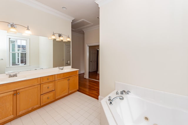 bathroom featuring hardwood / wood-style floors, crown molding, a relaxing tiled tub, and vanity