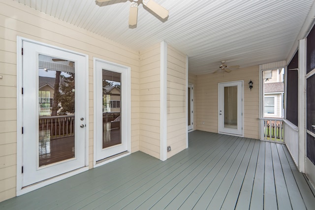 exterior space featuring ceiling fan