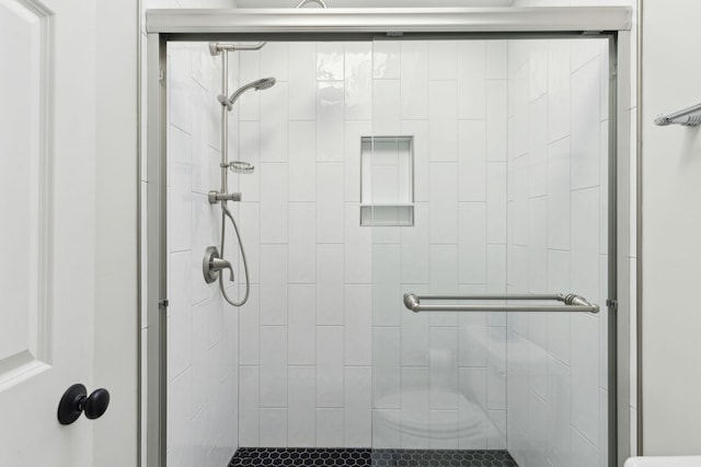 bathroom featuring walk in shower