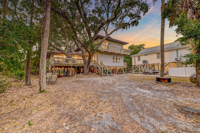 view of front of home featuring a wooden deck