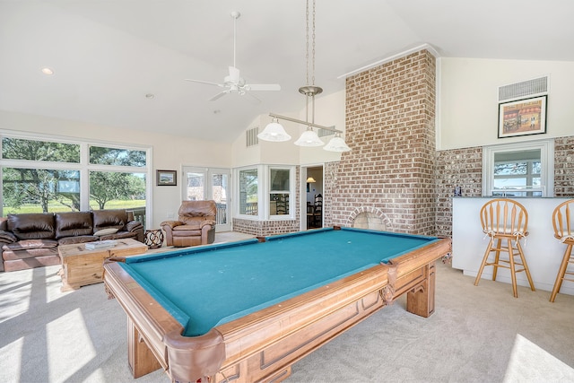 game room featuring high vaulted ceiling, pool table, a fireplace, carpet flooring, and visible vents