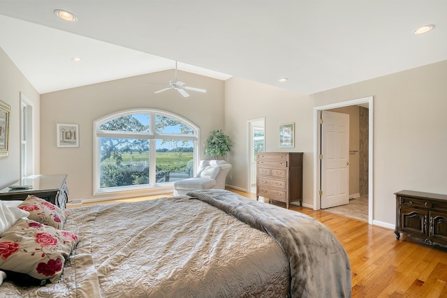 bedroom with a ceiling fan, lofted ceiling, light wood finished floors, and recessed lighting