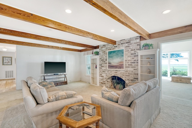 living area featuring recessed lighting, light colored carpet, visible vents, a brick fireplace, and beamed ceiling