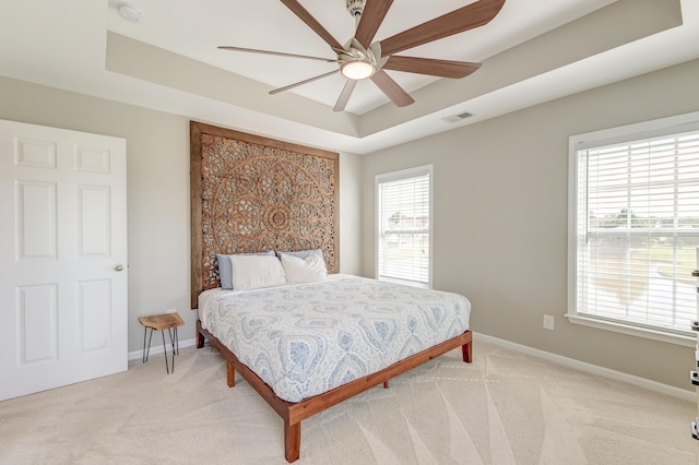 8038 Regency Elm Dr, North Charleston, SC 29406 - bedroom with light colored carpet, baseboards, and a raised ceiling