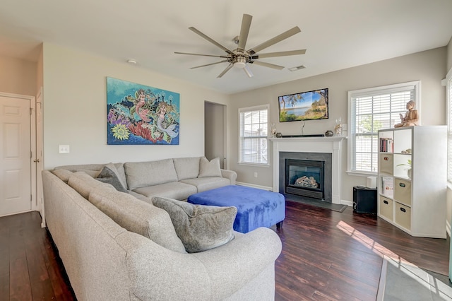8038 Regency Elm Dr, North Charleston, SC 29406 - living area with ceiling fan, dark wood finished floors, healthy amount of natural light, and a fireplace with flush hearth
