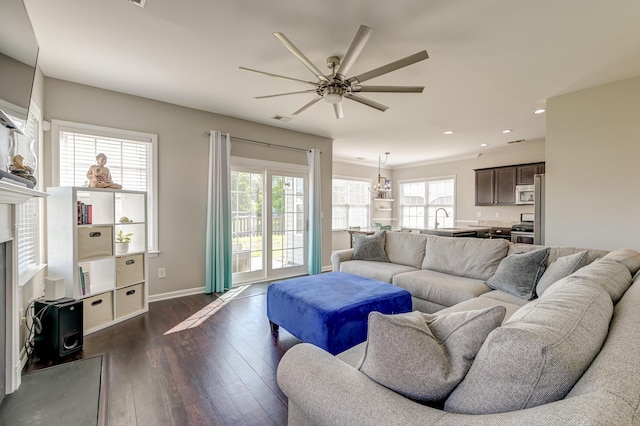8038 Regency Elm Dr, North Charleston, SC 29406 - living room featuring a ceiling fan, recessed lighting, dark wood-style flooring, baseboards, and a fireplace