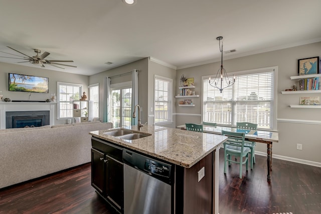 8038 Regency Elm Dr, North Charleston, SC 29406 - kitchen featuring dishwasher, a sink, dark wood-style floors, a fireplace, and light stone countertops