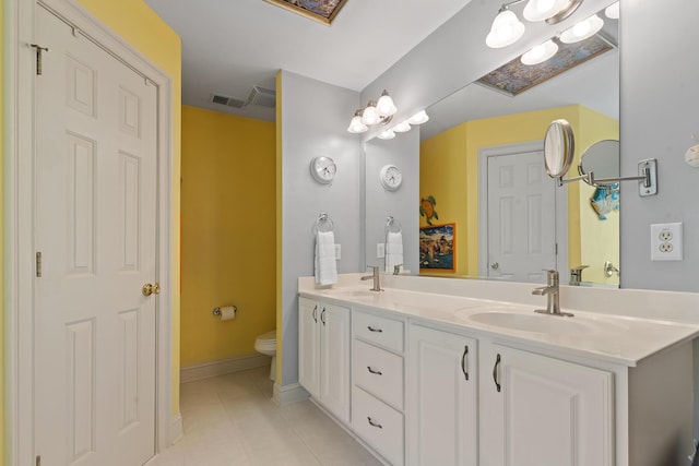 full bath featuring visible vents, a sink, tile patterned floors, and toilet
