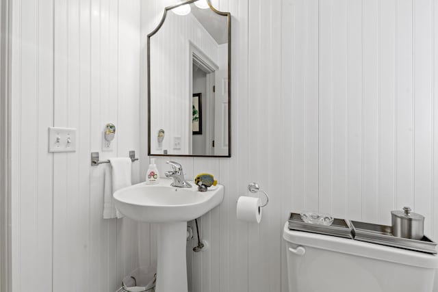 half bathroom with toilet