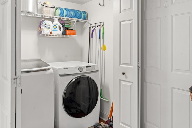 laundry area with laundry area and washing machine and dryer