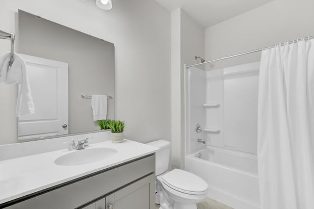 full bathroom with toilet, vanity, and shower / bathtub combination with curtain