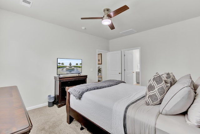 bedroom with ceiling fan and light colored carpet