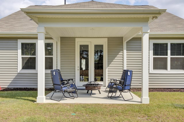 view of patio featuring an outdoor fire pit