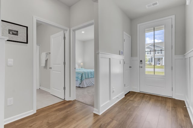 doorway featuring light wood-type flooring