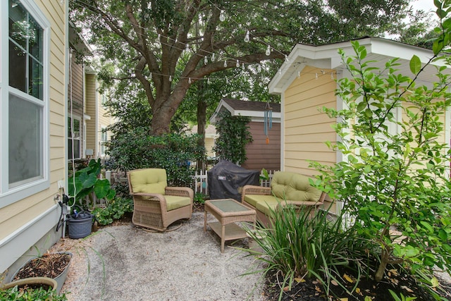 5134 E Liberty Park Cir N, Charleston, SC 29405 - view of patio featuring a grill, an outdoor hangout area, and a shed