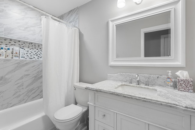 bathroom with toilet, shower / tub combo with curtain, and vanity