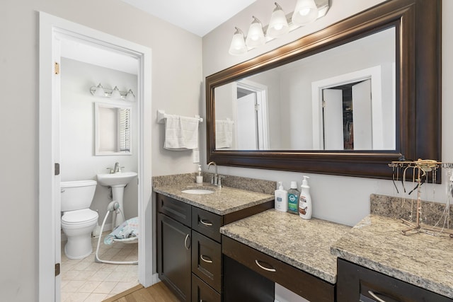 bathroom featuring toilet and wood finished floors