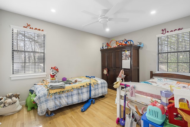 bedroom with recessed lighting, baseboards, wood finished floors, and ceiling fan