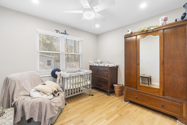 bedroom featuring ceiling fan and light wood finished floors