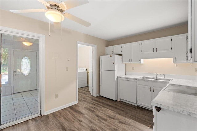 1383 Camp Rd Unit C, Charleston, SC 29412 - kitchen featuring white appliances, dark wood-style flooring, white cabinets, and light countertops