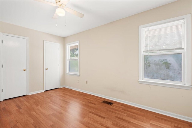 1383 Camp Rd Unit C, Charleston, SC 29412 - unfurnished bedroom with light wood-style flooring and a ceiling fan