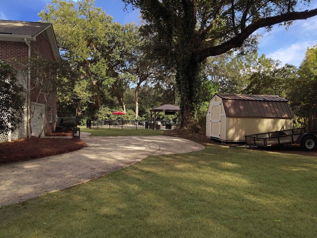 view of yard with a shed and a gazebo