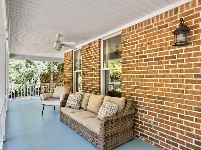 view of patio / terrace with ceiling fan and a porch