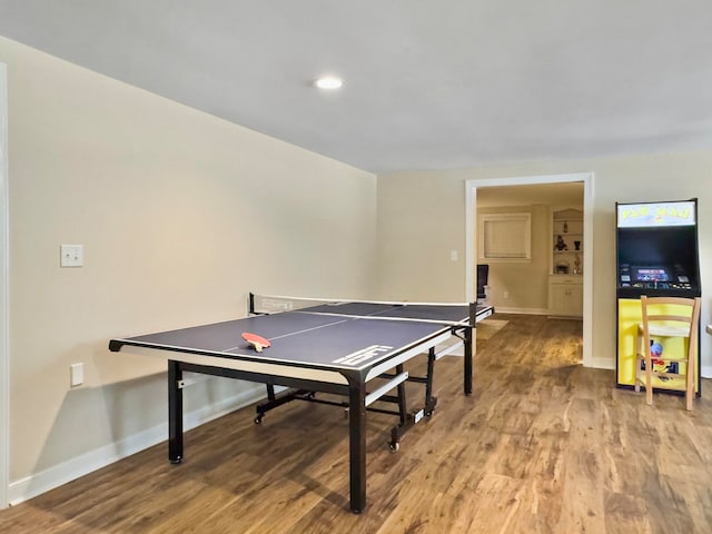 game room with hardwood / wood-style flooring