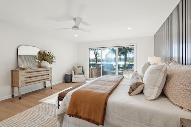 bedroom with ceiling fan, light hardwood / wood-style floors, and access to exterior