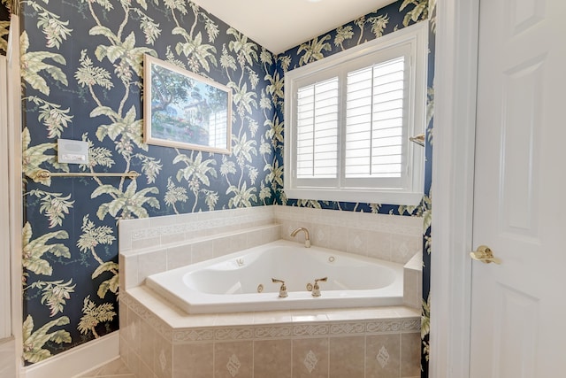 bathroom featuring tiled bath