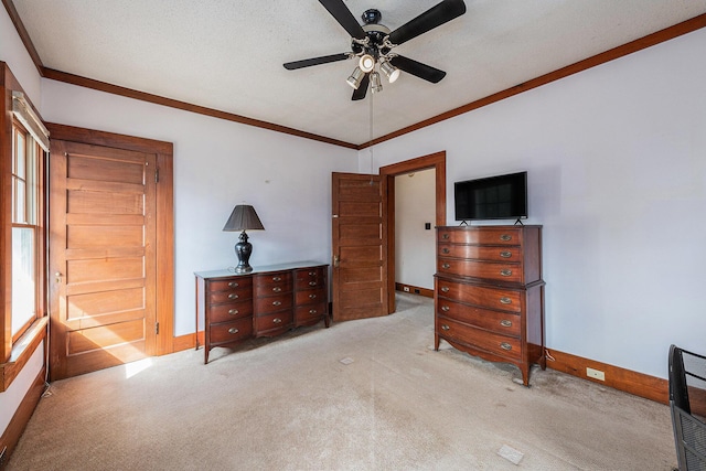 bedroom featuring light carpet, baseboards, ornamental molding, and ceiling fan