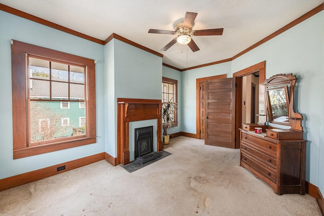 living room with light carpet, baseboards, a textured ceiling, and ornamental molding