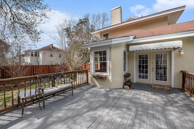 wooden deck with french doors and fence