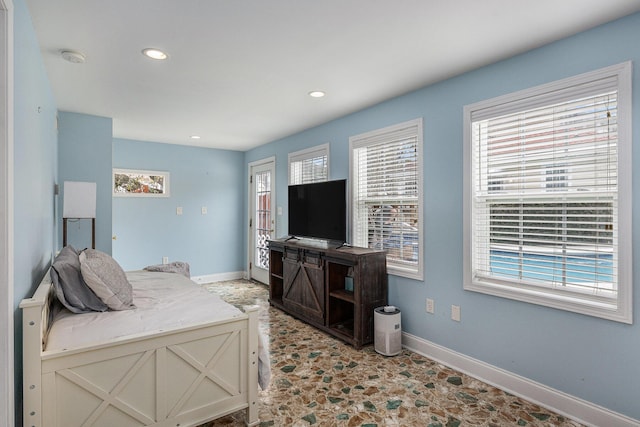 bedroom with recessed lighting and baseboards