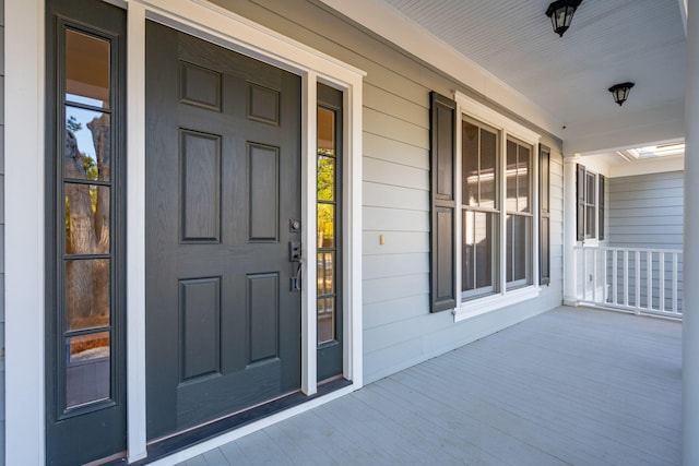 entrance to property with a porch