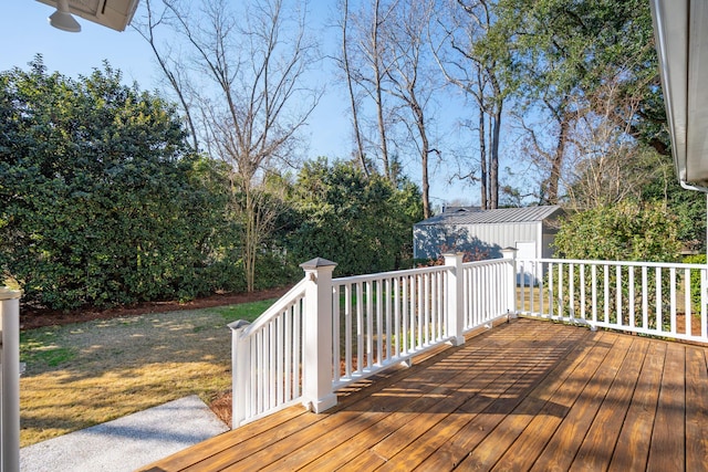 wooden terrace with an outdoor structure