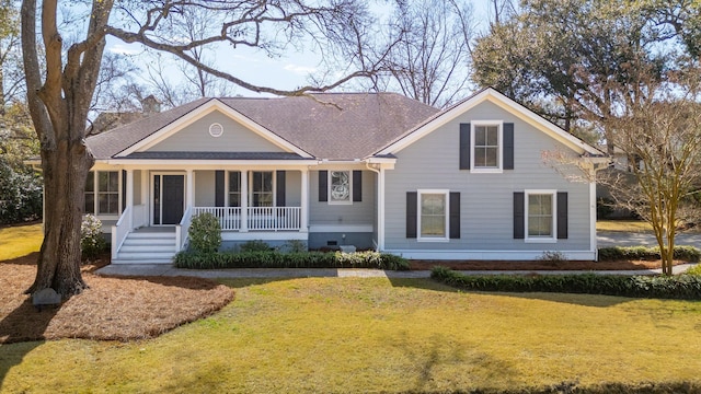 view of front of house with a front lawn, crawl space, a porch, and a shingled roof