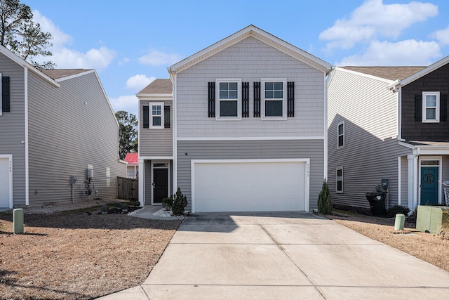 view of front of property with a garage