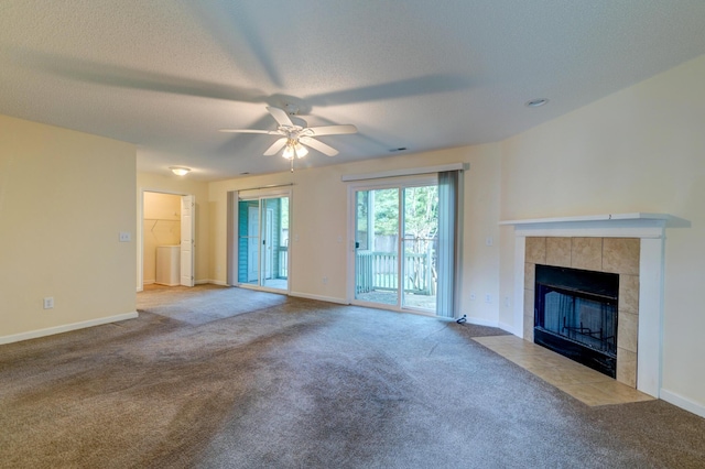 6280 Rolling Fork Rd Unit 302, North Charleston, SC 29406 - unfurnished living room with carpet floors, a ceiling fan, a fireplace, and a textured ceiling
