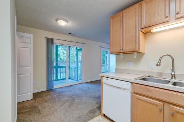 6280 Rolling Fork Rd Unit 302, North Charleston, SC 29406 - kitchen featuring dishwasher, light colored carpet, light brown cabinets, light countertops, and a textured ceiling