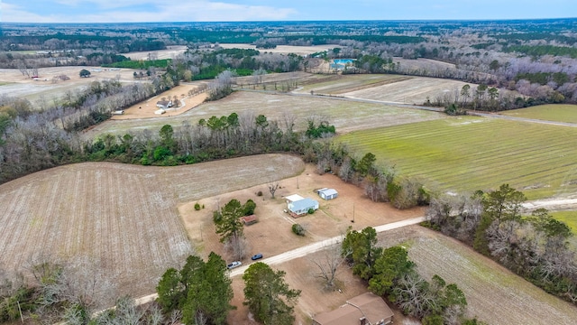 birds eye view of property with a rural view