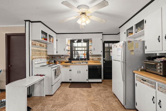 kitchen with white cabinetry and white appliances