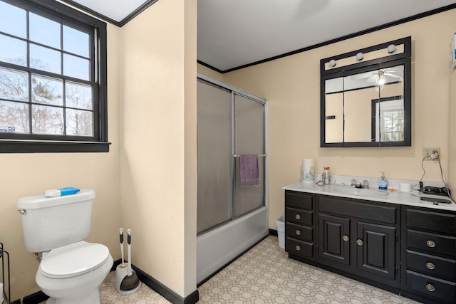 full bathroom with vanity, crown molding, shower / bath combination with glass door, and toilet