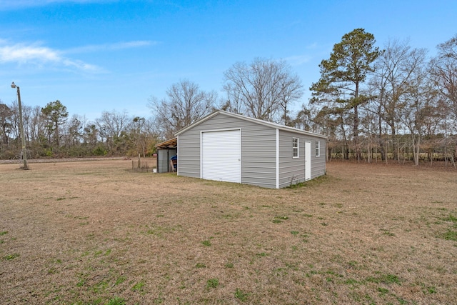 garage with a yard