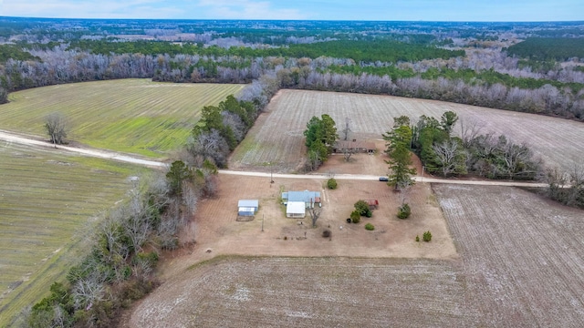 birds eye view of property featuring a rural view