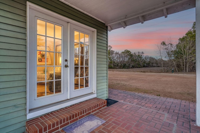 patio terrace at dusk with french doors