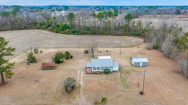 birds eye view of property featuring a rural view