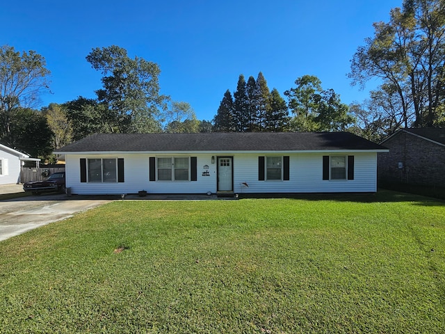 ranch-style house with a front lawn