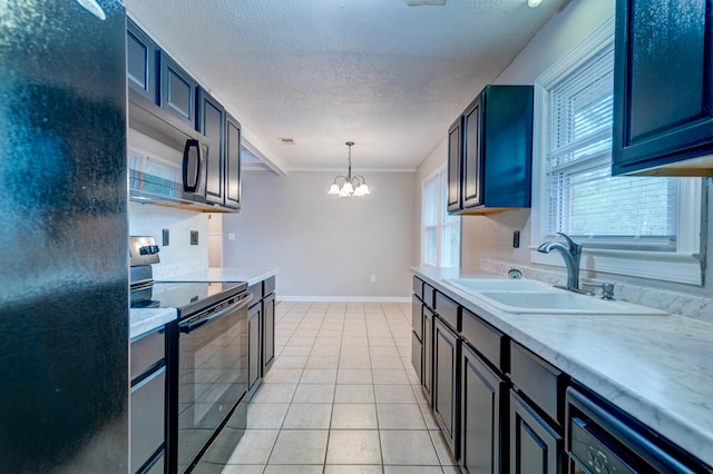 kitchen featuring sink, black appliances, light tile patterned floors, decorative light fixtures, and a notable chandelier